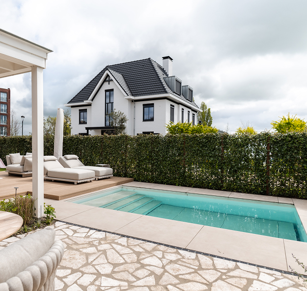 Swimming pool with natural stone terrace